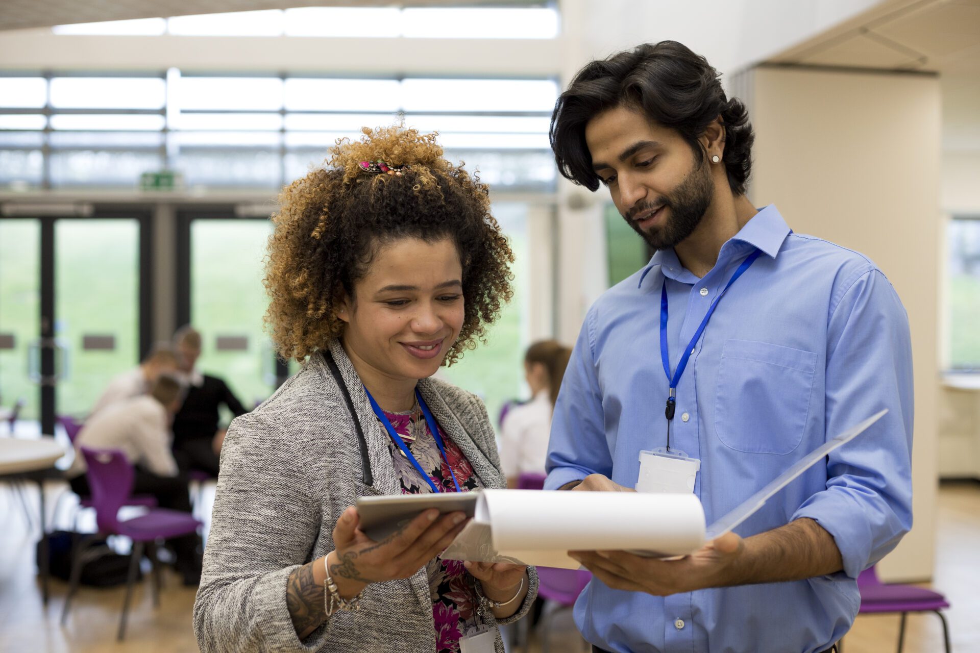 Teacher and High School Student with Tablet